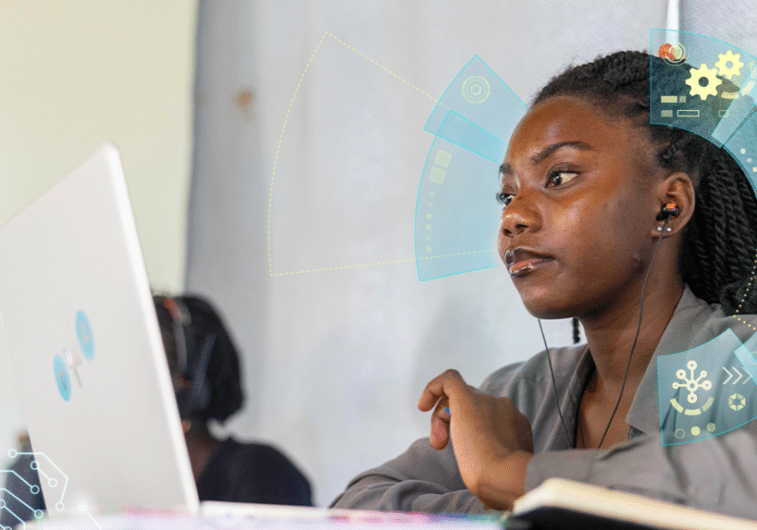 Young African woman sitting at a laptop with AI and tech-themed graphics surrounding her head, symbolizing innovation.