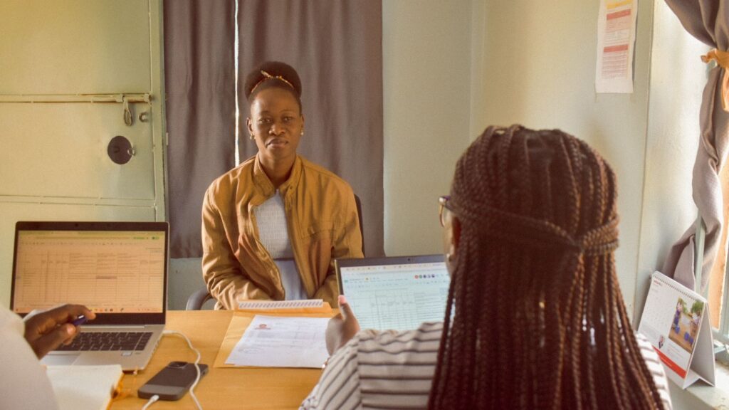 Young woman taking part in an application interview at the Groundbreaker Talents campus in Uganda.